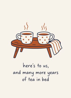 two cups of tea, 'here's to us, and many more years of tea in bed'